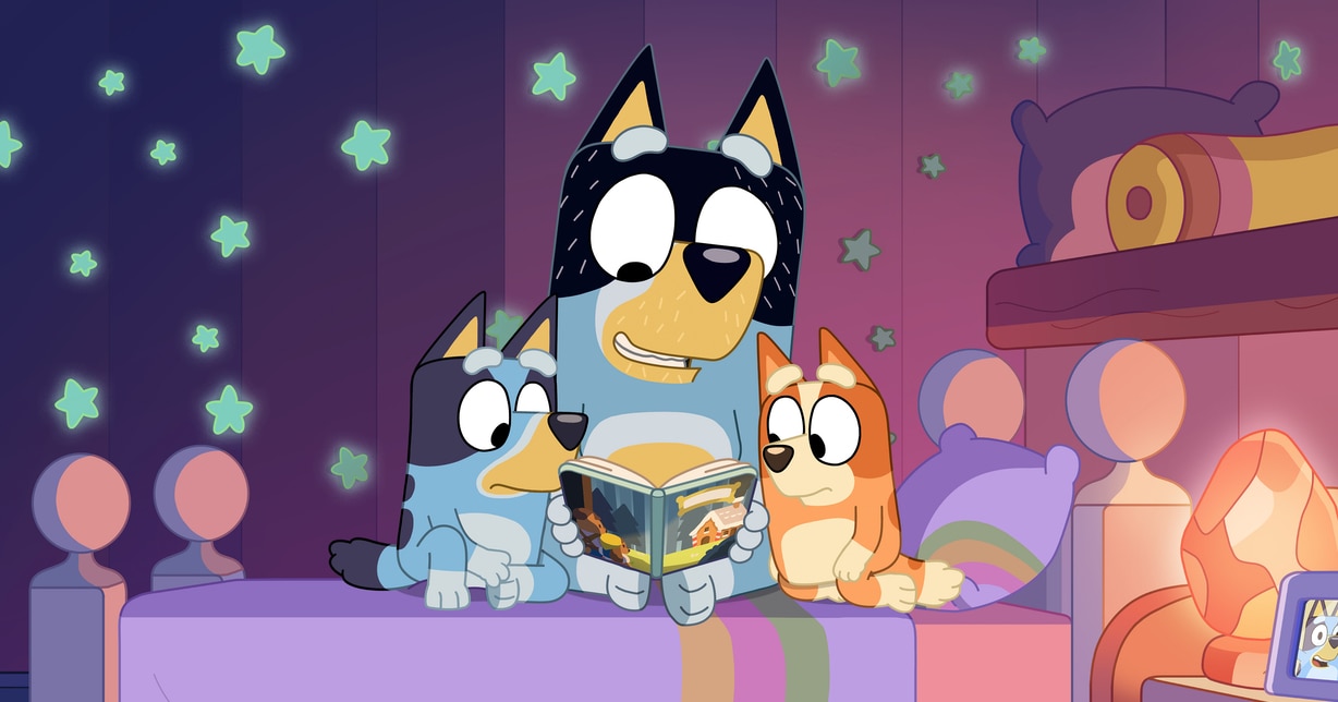 Bluey, Bandit and Bingo reading a bedtime story